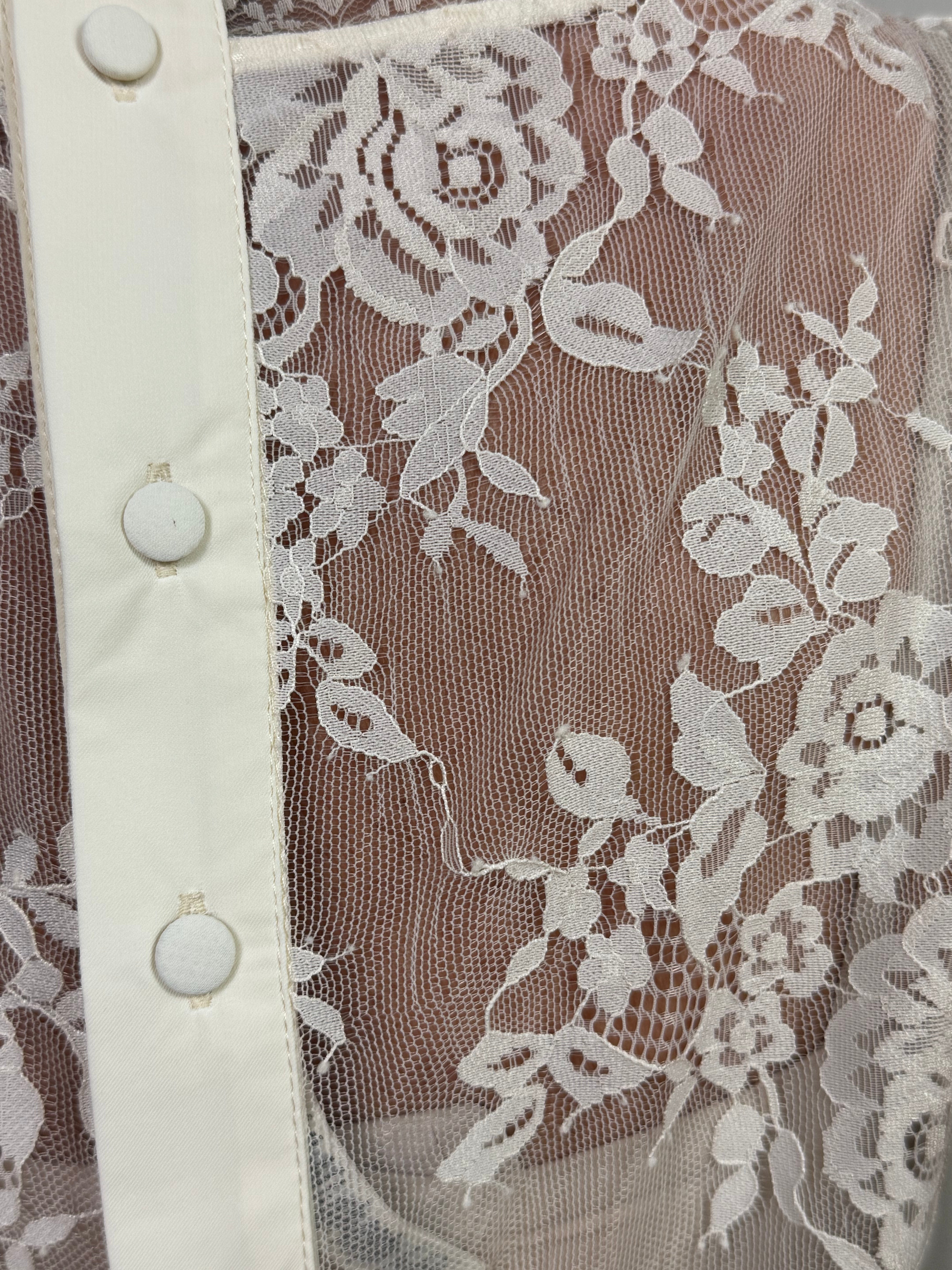 Top canotta smanicata in pizzo Susy Mix