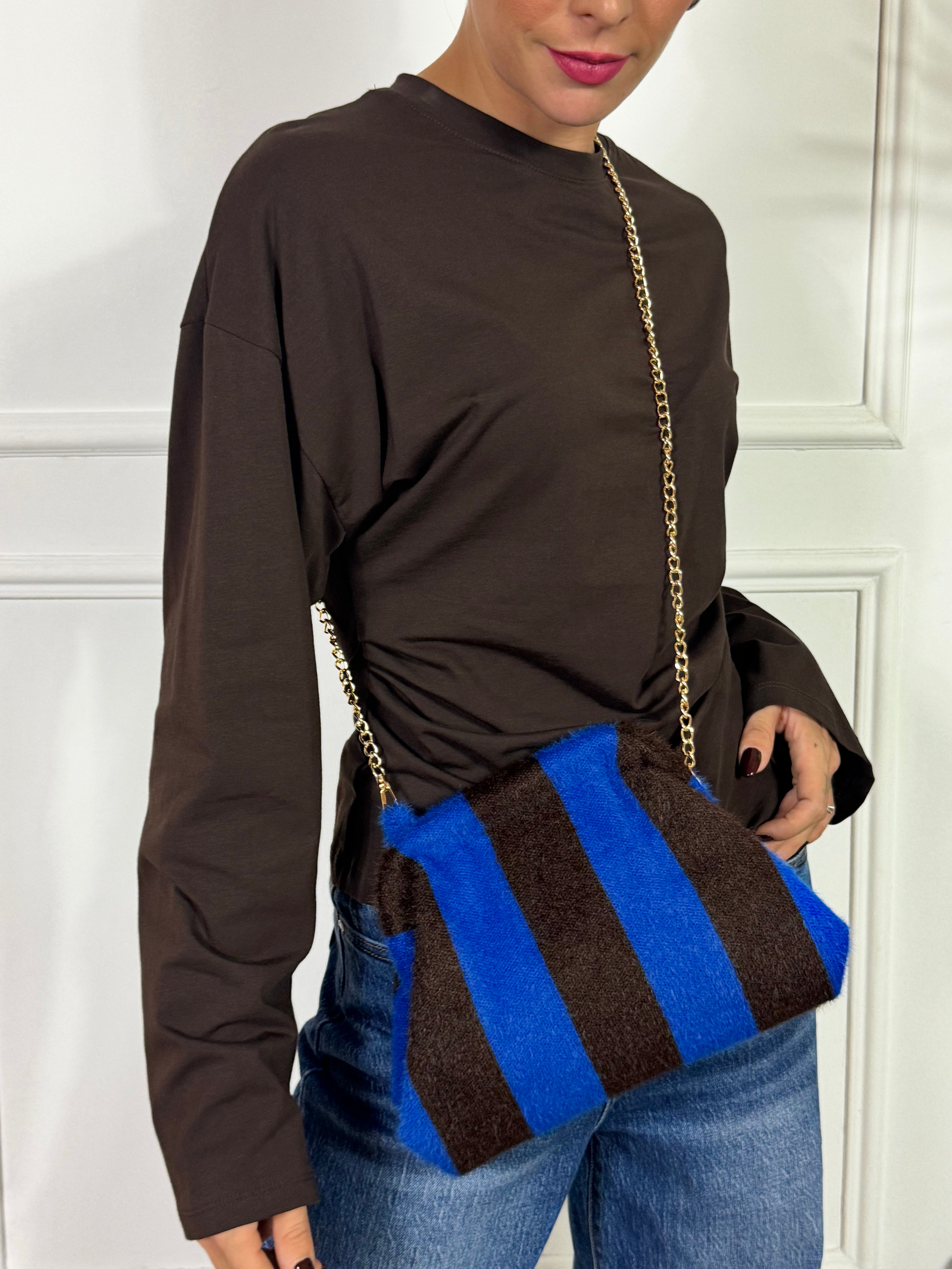 Borsa clutch pelosina a righe