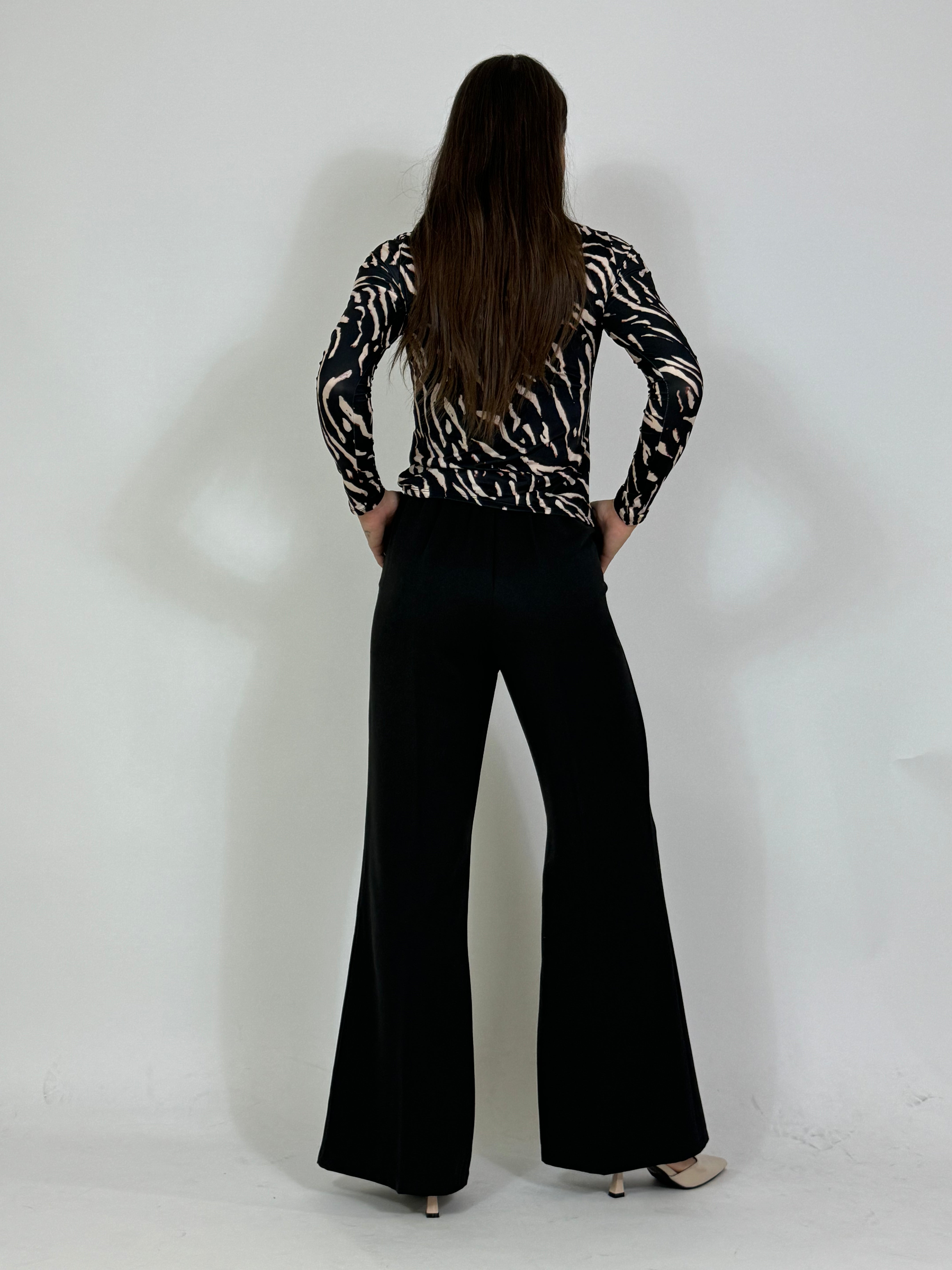 Pantalone Susy Mix a palazzo zampa con cintura