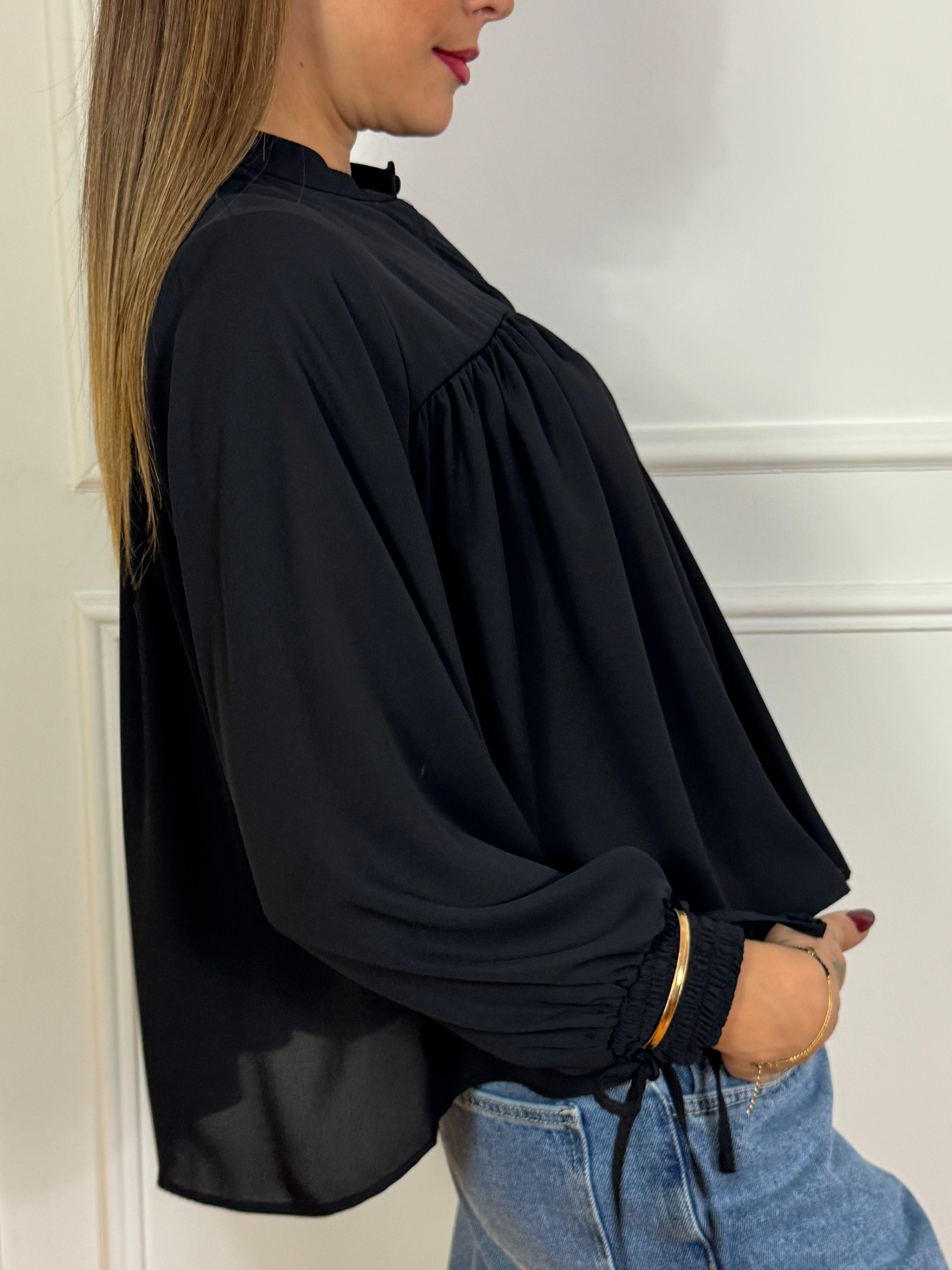 Blusa Kikisix con bracciali