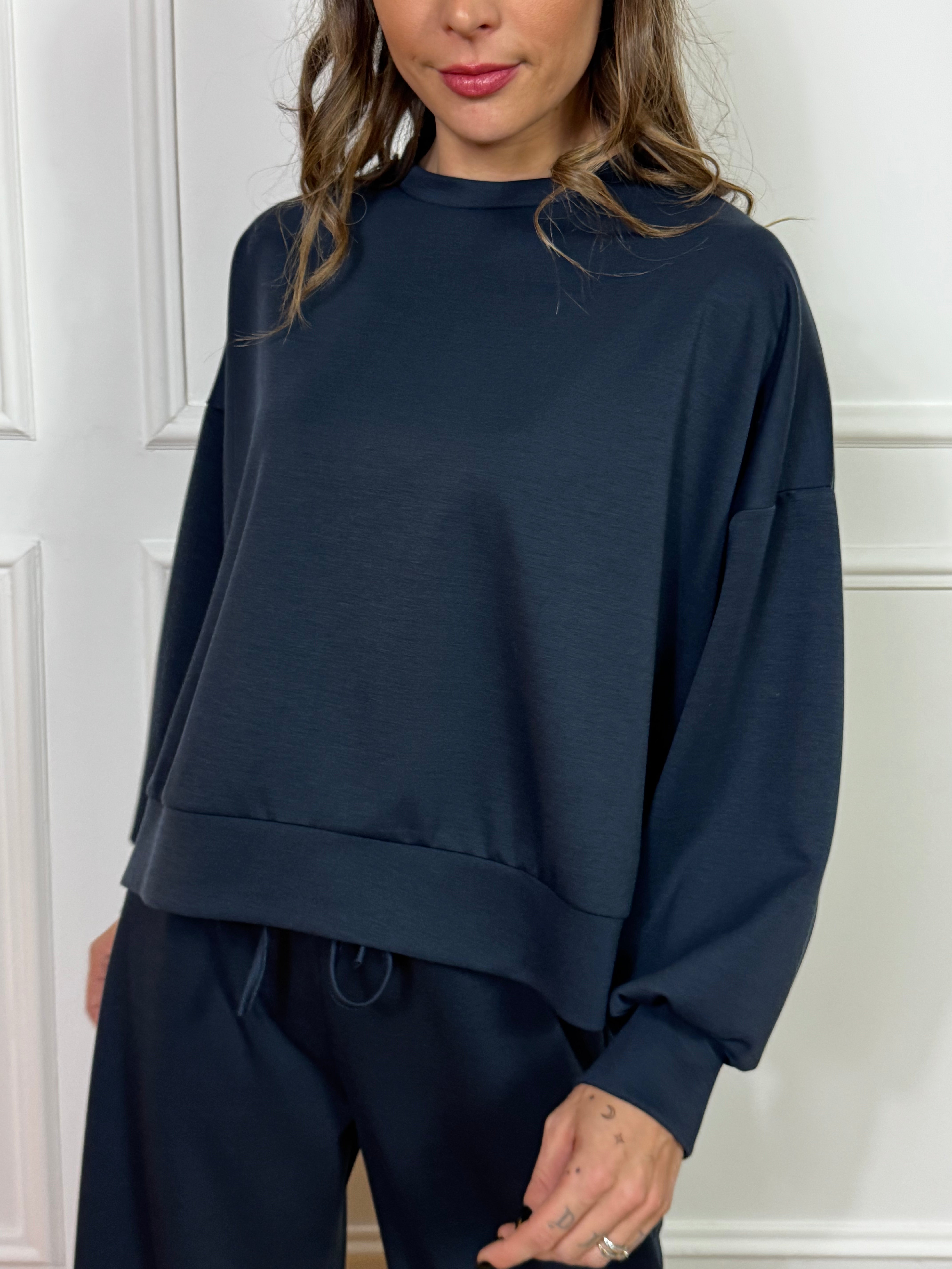 Felpa paricollo Kikisix spacchetti laterali tessuto tecnico sottile