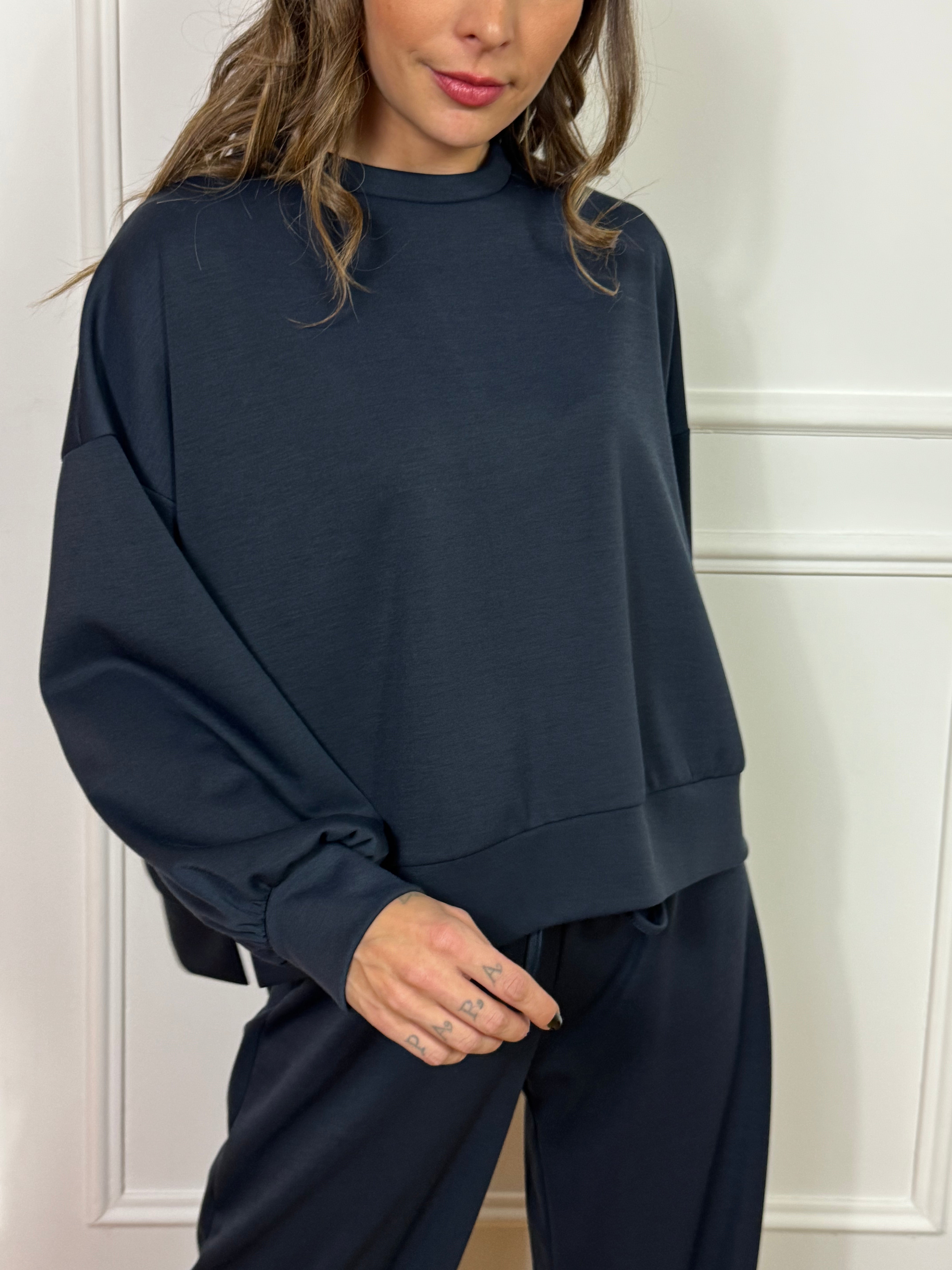 Felpa paricollo Kikisix spacchetti laterali tessuto tecnico sottile