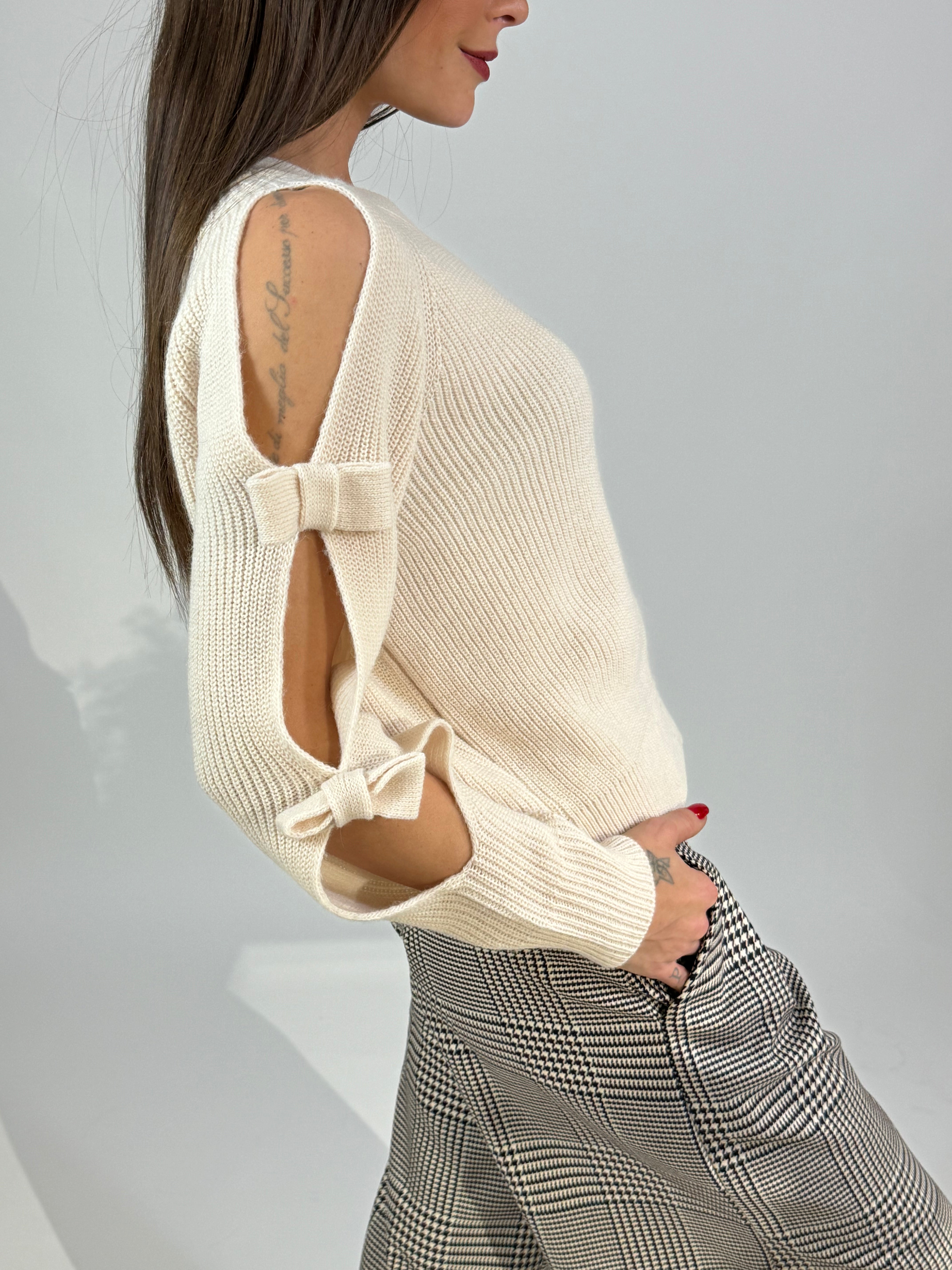 Maglia Tensione In monospalla con fiocchi sulla manica