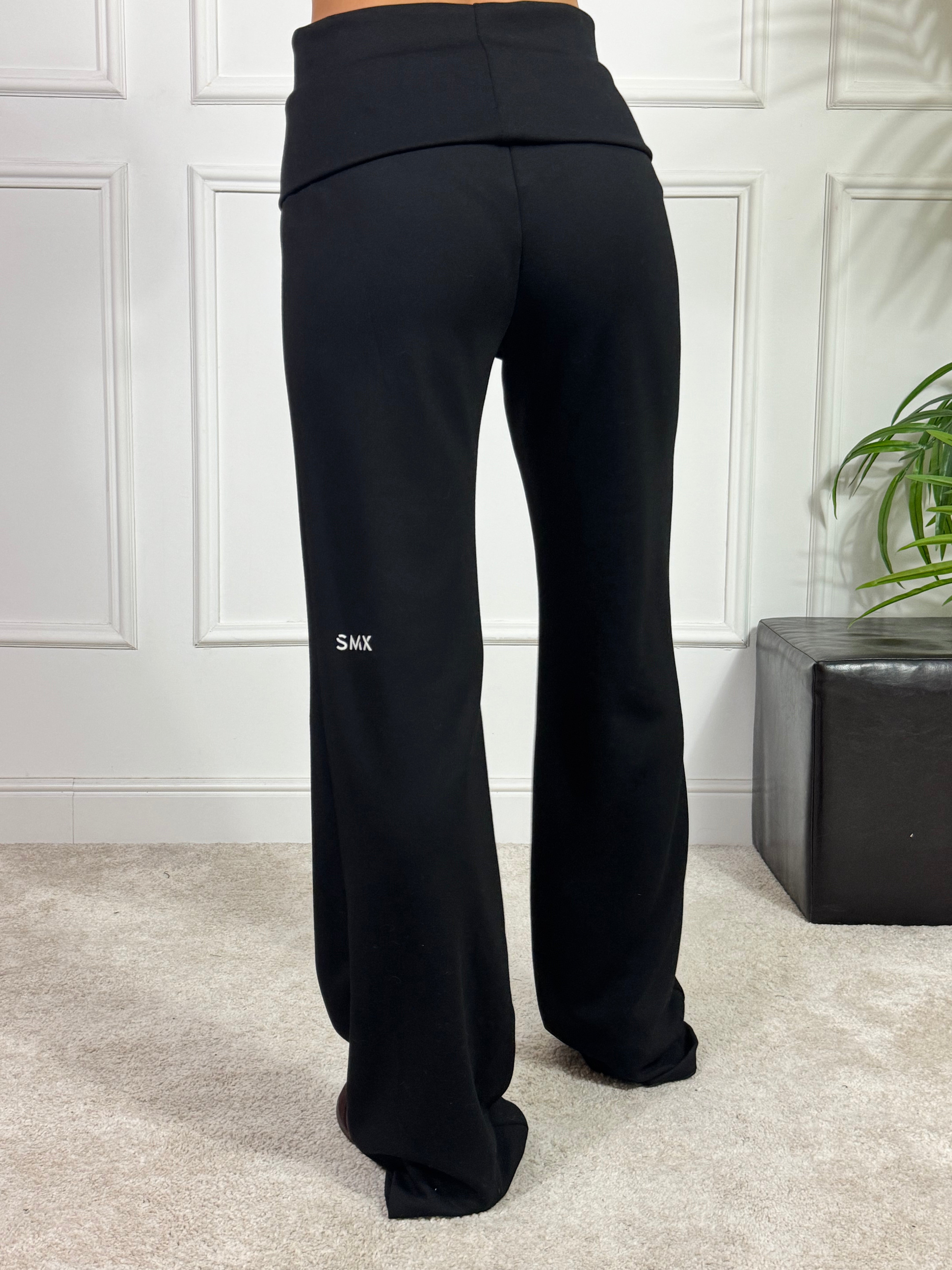 PANTALONE TUTA FLARED tessuto tecnico Susy Mix