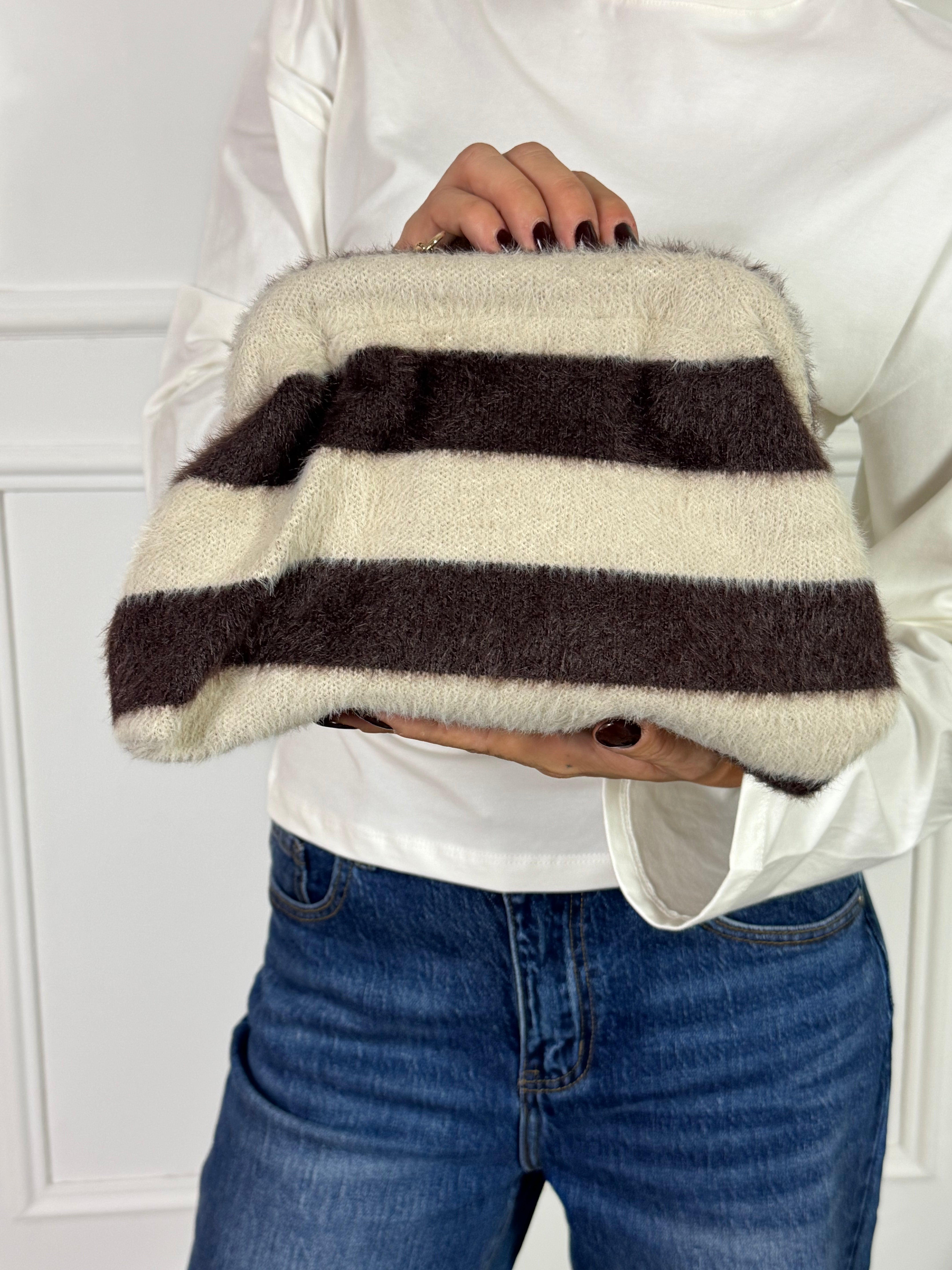 Borsa clutch pelosina a righe