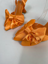Scarpa con tacco con fiocco raso